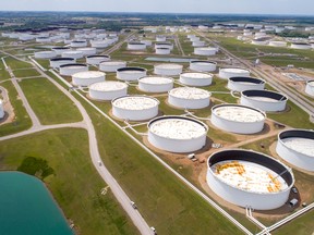 Crude oil storage tanks are seen in an aerial photograph at the Cushing oil hub in Cushing, Oklahoma. Oil is up about 30 per cent this year.