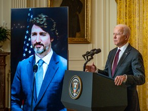 U.S. President Joe Biden and Canadian Prime Minister Justin Trudeau deliver opening statements via video link in the East Room of the White House February 23, 2021 in Washington, D.C.