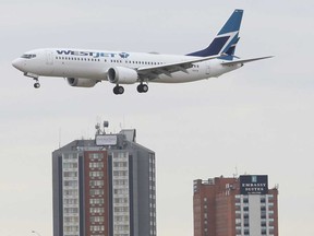 A Westjet plane arrives at Pearson International Airport from Calgary. The airline is suspending flights to to St. John's, N.L., London, Ont., and Lloydminster and Medicine Hat, Alta., between March 19 and June 24, 2021.