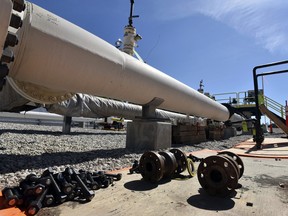 In this June 8, 2017, file photo, fresh nuts, bolts and fittings are ready to be added to the east leg of the pipeline near St. Ignace, Mich., as Enbridge prepares to test the east and west sides of the Line 5 pipeline under the Straits of Mackinac in Mackinaw City, Mich.