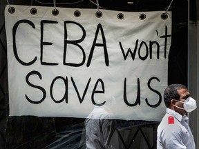 A business in Toronto posts a sign CEBA Won’t Help Us. Just over half of all businesses told StatsCan they did not know how long they could keep operating at their current level of revenue and expenses before considering bankruptcy or closing.