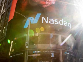 Nasdaq 100 tumbled to session lows after investors fled into companies whose fortunes are closely tied to the economic cycle.