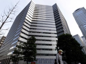 Nomura Holdings Inc. headquarters, in Tokyo. Nomura said it faced a possible US$2 billion loss due to transactions with a U.S. client.