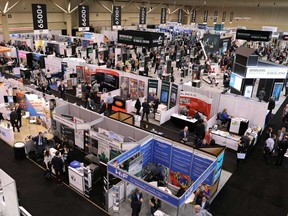 Visitors crowd booths at at the Prospectors and Developers Association of Canada (PDAC) annual conference in Toronto on March 1, 2020.