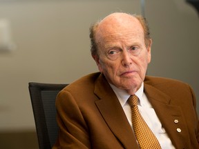Jim Pattison wearing a brown suit and gold tie.