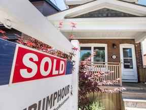 A real estate sign outside a Toronto home.