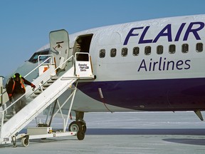 A Flair Airlines Boeing 737-400 aircraft at Edmonton International Airport.