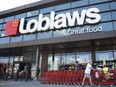 A customer exits a Loblaws store in Ottawa.