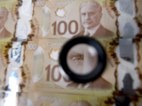 The image of Sir Robert Borden, former prime minister of Canada, is displayed on one hundred Canadian dollar banknotes.