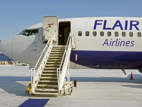 Flair Airlines Boeing 737-400 aircraft at Edmonton International Airport.