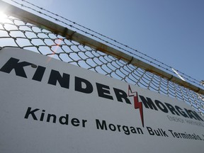 A sign hangs from a fence at a Kinder Morgan facility in Los Angeles, California.