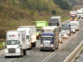 Transport trucks on a highway in Ontario