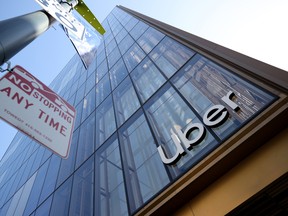 A sign is posted on the exterior of the new Uber headquarters on March 29, 2021 in San Francisco, California.