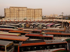 Buses parked at a station in New Delhi, India, on Tuesday, April 20, 2021. India’s Prime Minister Narendra Modi, who last year imposed a strict lockdown on short notice, asked states to avoid shutting businesses as the South Asian nation grapples with a new wave of Covid-19 infections that threatens a nascent economic revival.