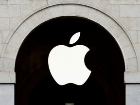 The Apple logo is seen on the Apple store in Paris.