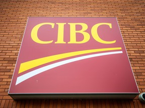 A CIBC sign outside a branch in Grimsby, Ont.