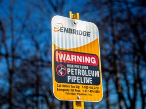 A signpost marks the presence of Enbridge's Line 5 pipeline, which Michigan Governor Gretchen Whitmer ordered shut down in May 2021, in Sarnia, Ont.