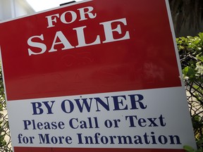 A sign that reads: For sale by owner