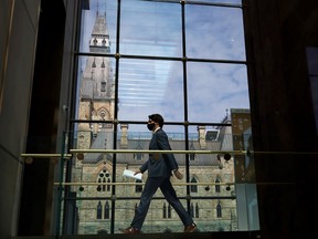 Prime Minister Justin Trudeau walks to a news conference in Ottawa on April 13