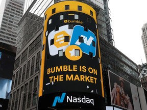 The display outside the Nasdaq MarketSite is pictured as the dating app operator Bumble Inc. (BMBL) made its debut on the Nasdaq stock exchange during the company's IPO in New York City, New York, U.S., February 11, 2021.