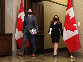 Justin Trudeau, Canada's prime minister, and Chrystia Freeland, Canada's deputy prime minister and minister of finance, arrive for a photo opportunity before tabling the federal budget in the House of Commons in Ottawa, on Monday.
