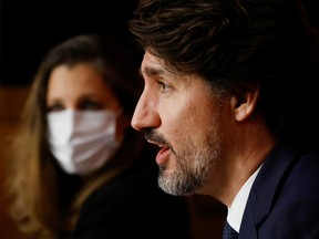 Prime Minister Justin Trudeau and Finance Minister Chrystia Freeland take part in a news conference on Tuesday.