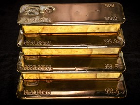 Four stacked gold bars