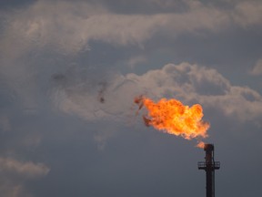 lame burns from a stack at the Syncrude Canada Ltd. refinery north of Fort McMurray