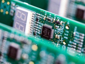 A microchip manufactured by NXP Semiconductors NV, on a printed circuit board (PCB) at CSI Electronic Manufacturing Services Ltd. in Witham, U.K.