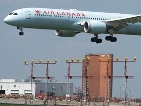 Air Canada Boeing 787 Dreamliner touches down at Toronto Pearson International Airport. The Montreal-based airline has been focusing on cargo and domestic flights, as strict Canadian restrictions forced it to slash capacity for international travel and cut costs while a third wave of COVID-19 infections in the country ravages demand.