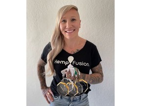 Two-time Olympic Gold Medalist in Bobsled, Kaillie Humphries, holds her five World Championship medals.