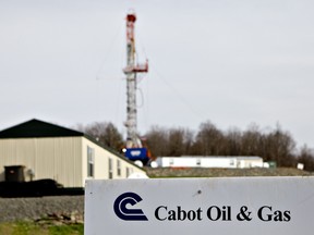 A Cabot Oil & Gas sign stands at the entrance to a natural gas well drilling site in Dimock, Pennsylvania, U.S.
