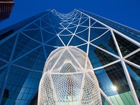 The Bow building headquarters for Cenovus Energy in Calgary. Cenovus, which acquired Husky Energy earlier this year for about US$5 billion, said its total production rose 64.7 per cent in the quarter.