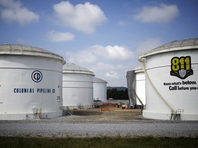 Storage tanks at the Colonial Pipeline Co. Pelham junction and tank farm in Pelham, Alabama, U.S., on Monday, Sept. 19, 2016. Fuel suppliers are growing increasingly nervous about the possibility of gasoline and diesel shortages across the eastern U.S. almost two days after a cyberattack knocked out a massive pipeline.