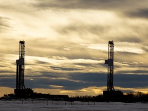 A pair of rigs work in a field southwest of Wembley late last month. There were 94 active rigs in Alberta as of March 4 as companies scramble to race against the coming spring breakup. A private members bill passed second reading February 25 and if it passes third reading it will exempt farm fuels from the carbon tax. 

 RANDY VANDERVEEN