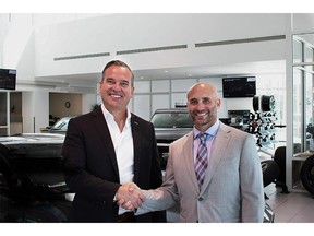 Kevin Kutschinski, CEO of Foundation Automotive Corp., and Josh Letis, managing partner of Medved Autoplex, celebrate their newest dealership acquisition. Foundation Hyundai is the first Hyundai dealership in the booming automotive group.