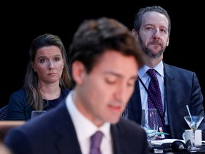 Katie Telford and Gerald Butts seen with Prime Minister Justin Trudeau in this 2016 photo.
