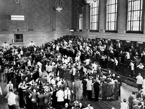 This photo dated October 1929 shows traders rushing on Wall Street as the New York Stock Exchange crashed, sparking a run on banks that spread across the country.