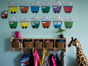 Children's backpacks and shoes are seen at a daycare