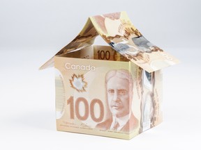 A house built out of Canadian $100 banknotes