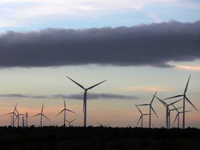 Wind turbines at dusk.