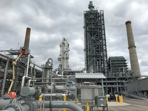 Equipment used to capture carbon dioxide emissions is seen at a coal-fired power plant in Texas.