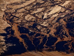 An aerial view of oilsands near Fort McMurray, Alberta. While some of Canada’s largest companies reported combined net profits of $3 billion in the first quarter, they have focused on capital discipline and paying down debt.