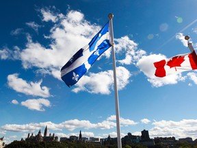 The Quebec and Canadian flags