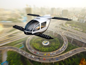 An artist's rendering of an 'air taxi' flying above an urban centre.