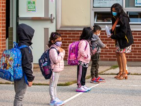 Students line up at a school in Toronto