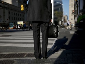A commuter in Toronto's financial district