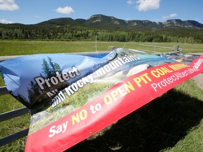 Ranchers against the Alberta government's new coal mining plan set up an anti coal mining sign at Cabin Ridge north of Blairmore, Alberta, Canada June 16, 2021. Ranchers and area residents are concerned about environmental pollution from the proposed mine at Cabin Ridge.