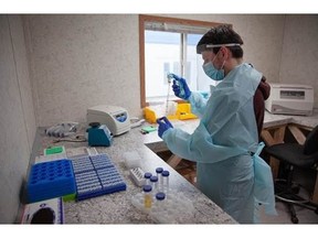 A BioAro laboratory technician testing COVID-19 samples at their laboratory in Gahcho Kué diamond mine in the Northwest Territories, where results can be produced within hours.
