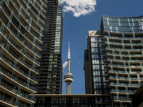 The CN Tower is framed by condo buildings off of Fort York Blvd., west of Spadina Ave. in Toronto, Ont.  REITs appear to be staging a smart comeback.